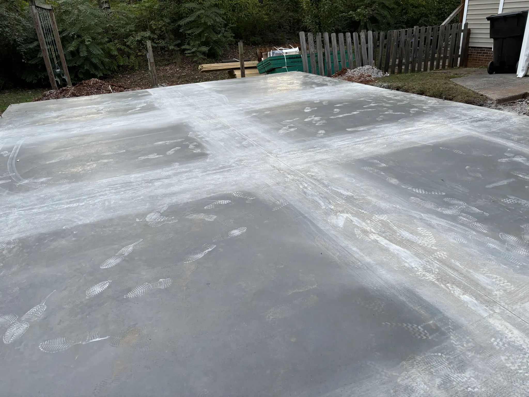 Large finished concrete patio slab in a backyard in Maryville, Tennessee