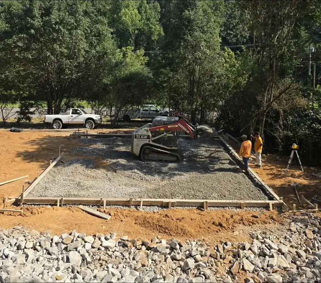 Compacted gravel base and forms set for a concrete slab in Maryville, Tennessee
