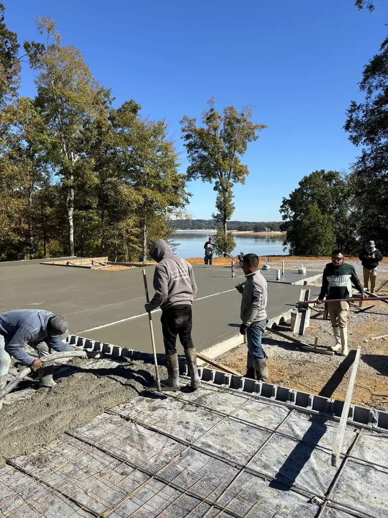 Crew screeding a large concrete pour in Maryville, Tennessee