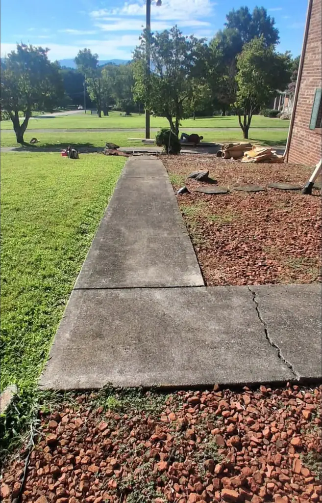 Cracked concrete walkway before replacement in Maryville, Tennessee